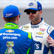 Jimmie Johnson speaks with Casey Mears while on the grid at Daytona 500 pole qualifying last Sunday, in which Chase Elliott won the pole and Matt Kenseth qualified on the outside.